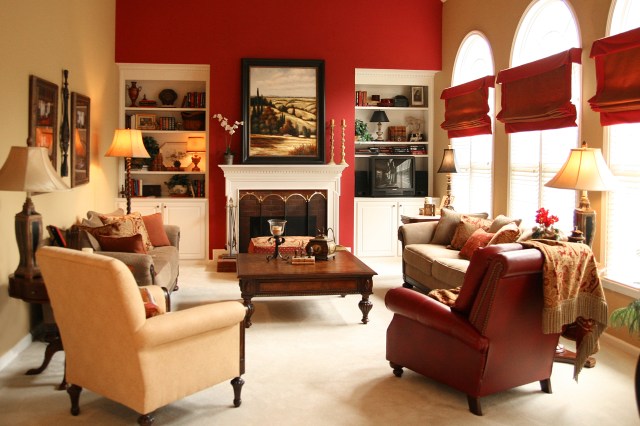 Injecting excitement, by using a strong red hue on the accent wall.