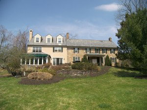 This year's designer house is called Serendipity Farm.  My room is the lovely sunroom seen on the lower left of the home in this photograph.   In addition to the interior renovations, the gardens will be also transformed during the designer house.