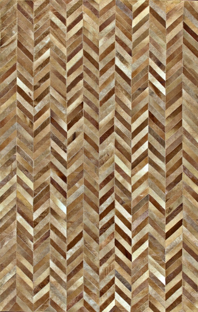 An amazing 8x10 area rug made from strips of cowhide, sewn together in a herringbone pattern.