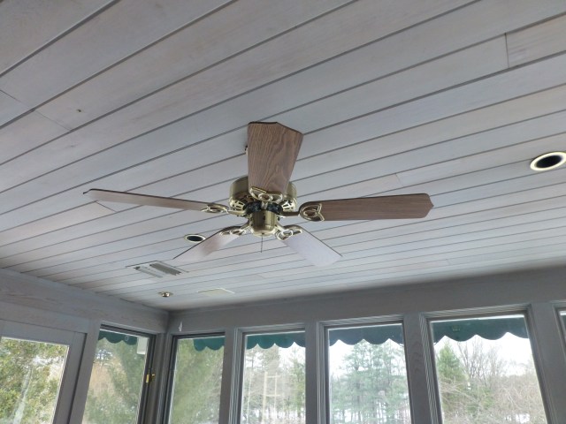 The dated ceiling fan will definitely have to go, but check out the lovely stained woodwork.  I really like the gray, don't you?