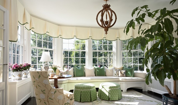 These ivory valances with green banding are so pretty and elegant in this sunroom.  I'm thinking of doing something similar in my designer house sunroom.  