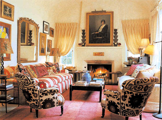 Designer Kathryn Ireland uses a wide variety of ethnic fabrics and fine antiques to create her own unique style with bold colors and strong patterns.