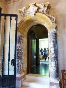 The entry boasts marble columns and carved stone-work.  Very distinctive!