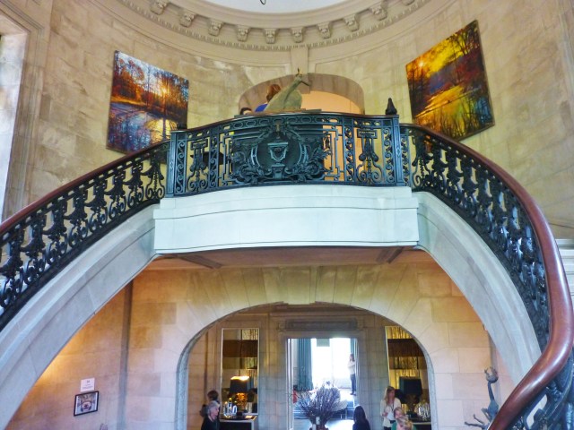 The iron railings are just magnificent.  I love they way they curve around and meet each other at the landing.  The artwork placement by Broadfoot & Broadfoot was very well done!