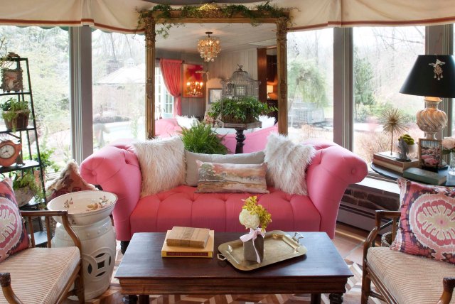 Another view of the main seating area, featuring the mirror and settee.  I used plenty of great vintage, antique, and modern accessories, along with plants and natural materials throughout the room.