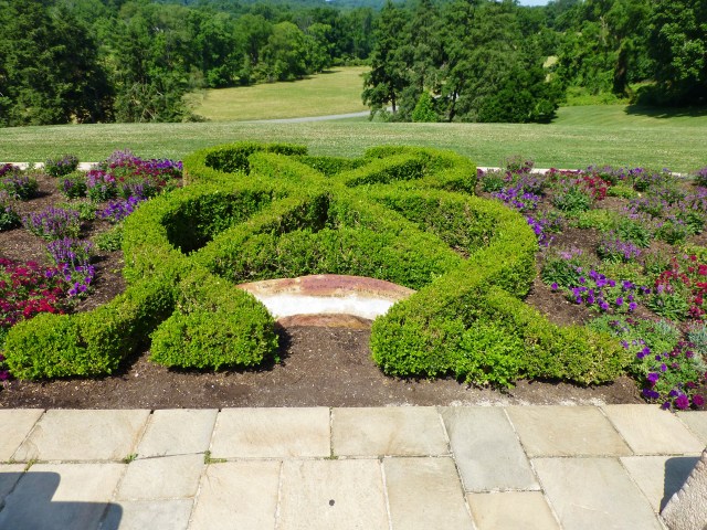 This verdant knot garden overlooks the valley below the cathedral.  The inscription on the stone is from the book of Revelations in the Bible:  "I am the Alpha and the Omega the Beginning and the End the First and the Last."