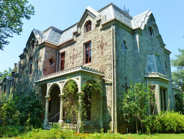 The back porch is actually slightly larger than the front porch and has a lovely view of the rear garden.  You can also see the bay window on the side of the mansion, which is a prominent feature of the main parlor inside the house.