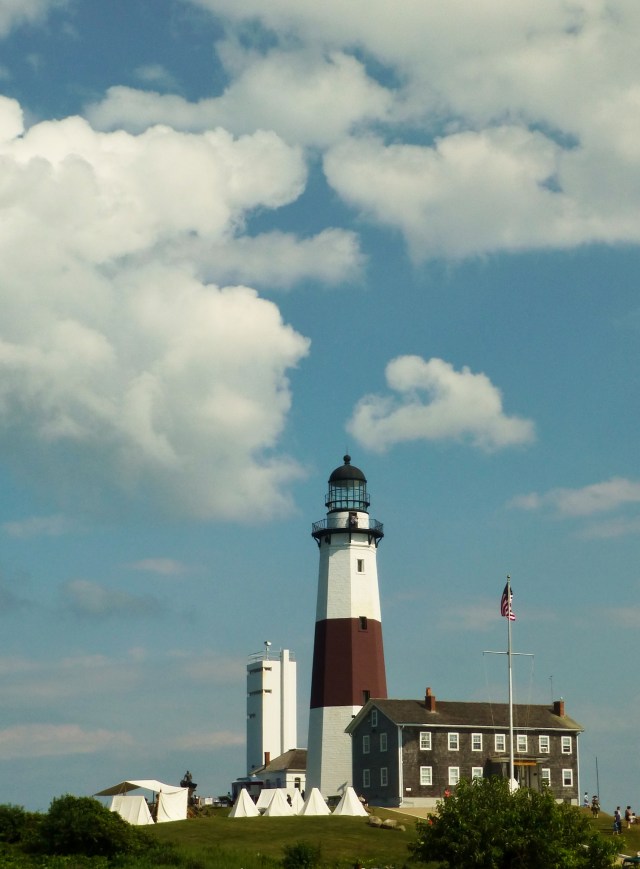 The Montauk Point Lighthouse as seen from the parking area on a gorgeous August afternoon. The tents you see on the left are part of an historic reenactment that was going on the day we visited.