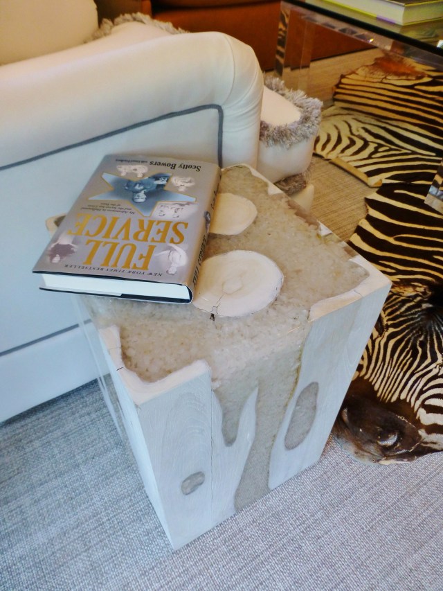 Here's a detail of the square white drinks table.  It appears to be bleached wood with a chunky clear epoxy poured into the voids.  I'm not sure of the actual composition, but I think it's wonderfully interesting!  I'm really loving the current trend of using these sculptural tiny tables adjacent to comfy seating.