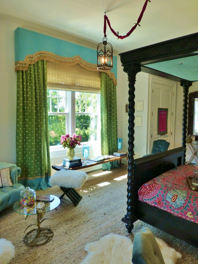 I'll leave you with this final image, looking back toward the entrance.  Did you notice the cool lantern that's swagged across the ceiling.  I really like the knotted cord cover, which gives it a bohemian feel. Also, in this image you can appreciate the draperies again.  Notcie the contrast banding at the hem, in the same fabric used to fabricate the cornice.  So pretty!  I love details like these.