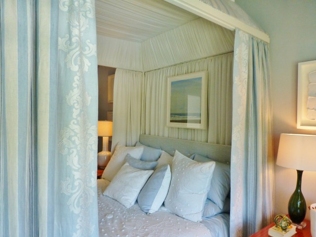The amazing canopy bed is a cocoon of soft white textures.  I love the bedspread.  Can you see the panels on the bedhangings, and the amazing pearlescent embroidery work?