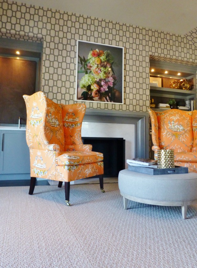 To the left of the fireplace is a built-in wet bar complete with a mini fridge and everything one might need in a private master bedroom.  How luxurious!