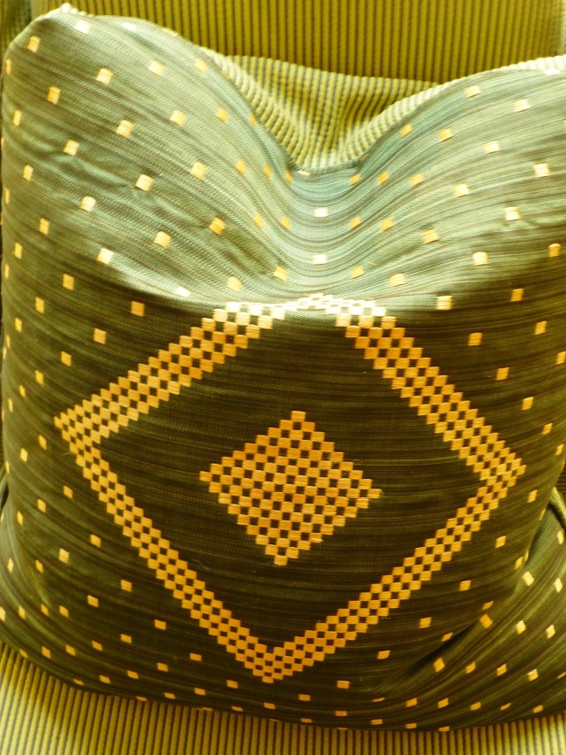 Here's a detail of the horsehair fabric. Many passersby would not even recognize this precious fabric, which is woven from the main and tail hair of horses. Horsehair fabric is usually in the $300 and up price-range and has been used for centuries to upholster fine furniture. I particularly admire the embroidered geometric pattern on this particular example.