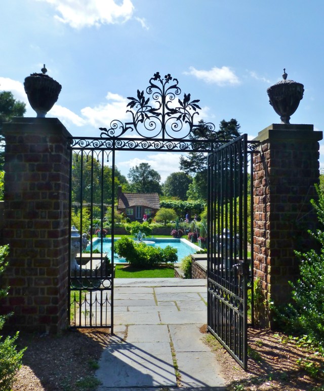 The absolutely stunning gates leading to the pool garden at Planting Fields.   The brick columns, topped with decorative urns, provide a stately feel to the pool area.