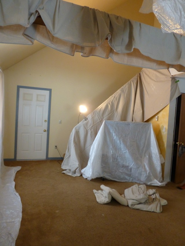 We've been doing a lot of the work on 'The Shack' ourselves and there is still a lot to be done! Here, you see our preparations for painting the vaulted living area. The yellow sponge-painted walls are now, thankfully, a thing of the past.
